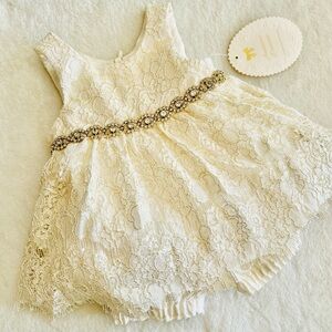 Elegant Lace Baby Dress with Gold Accents
